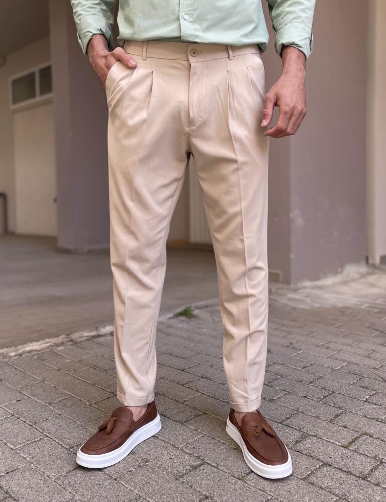 Ανδρικό μπεζ υφασμάτινο παντελόνι με πιέτες και λάστιχο στην μέση FCL00495M φωτογραφία